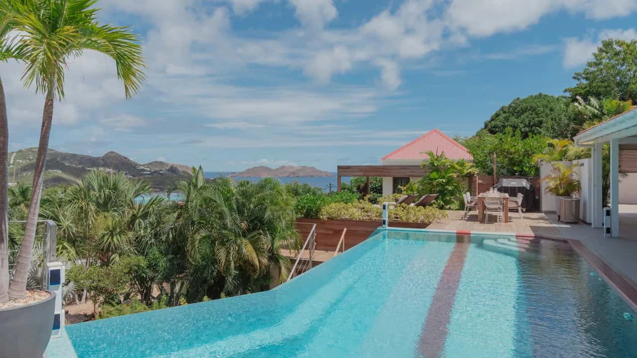 Panoramic Pool Deck And Garden Oasis