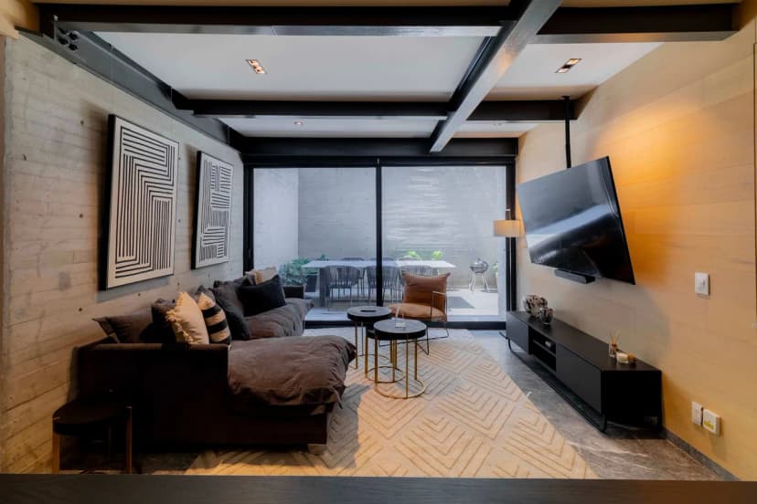 Capitalia | Patio-Connected 1BR Steps from Masaryk