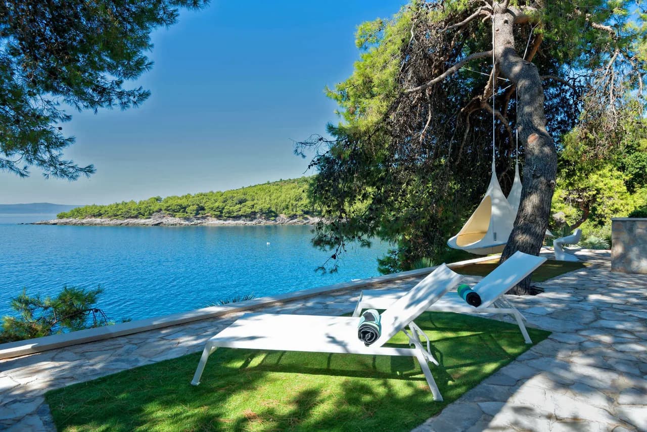 Belle villa en bord de mer avec jacuzzi privé et hamac