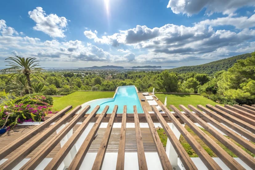 A Gaudi-influenced villa in lush gardens, with sea views to Las Salinas and Formentera