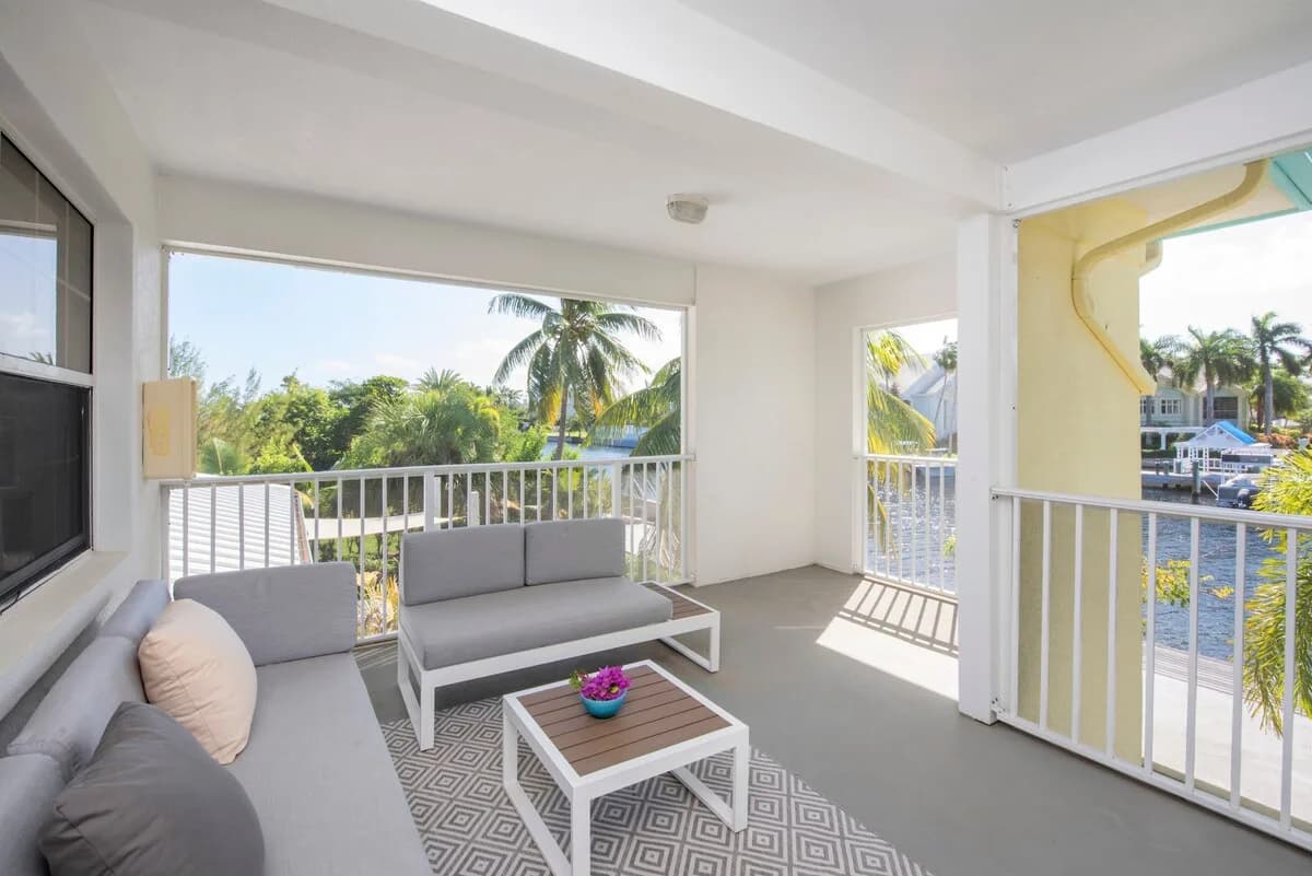 Snug Harbour View #7 – 2BR Canal Front Condo by Seven Mile Beach photo 4