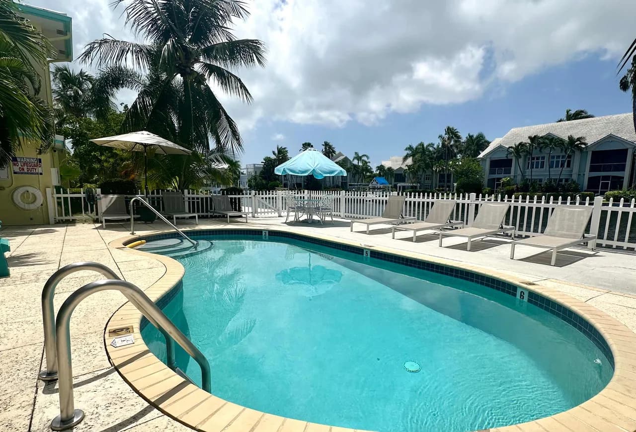 Snug Harbour View #8 – 2BR/2BA Canal Front Condo by Seven Mile Beach photo 2