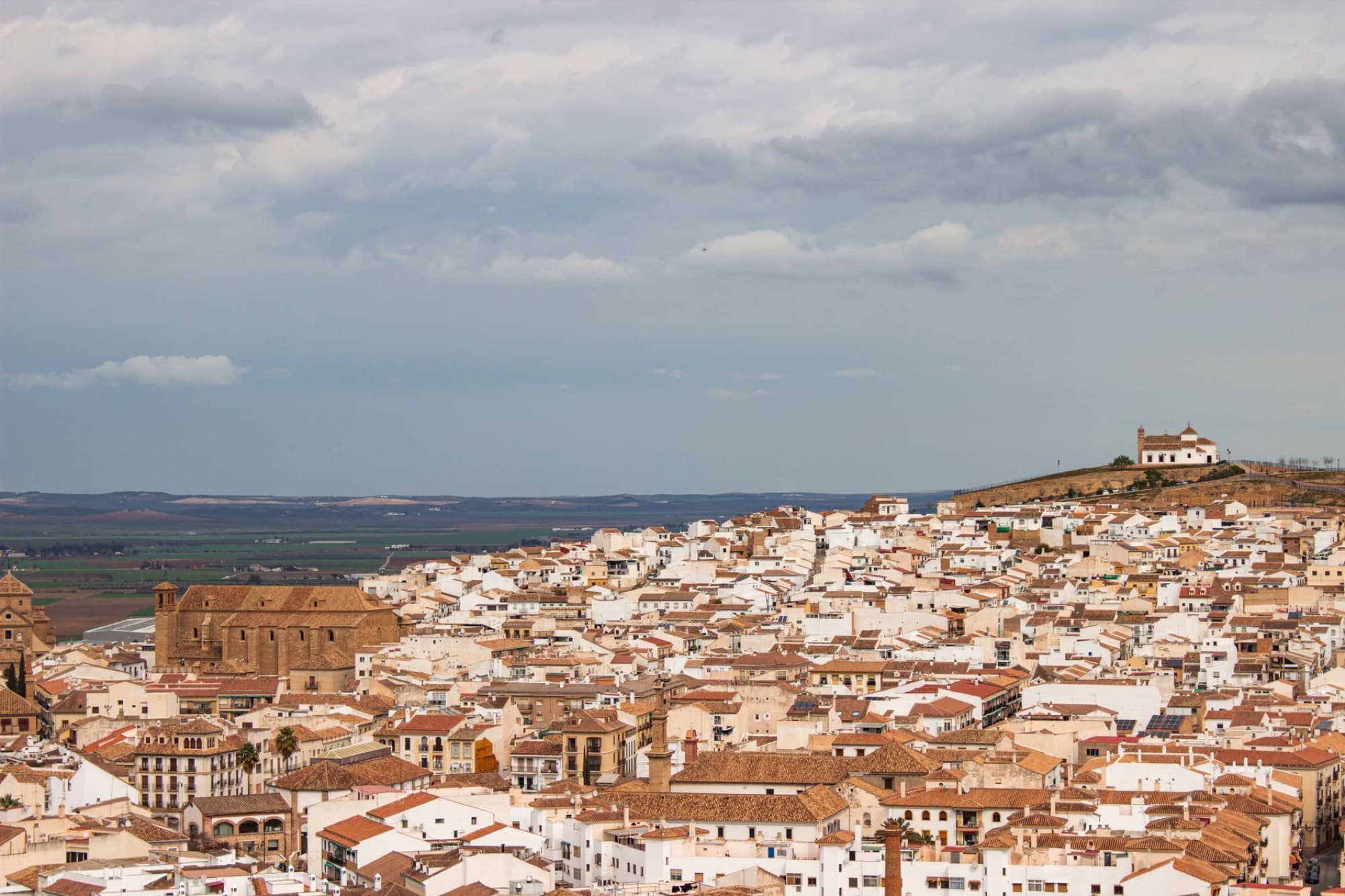 Stunning aerial view of Antequera, Andalucía showcasing historic architecture and landscape.