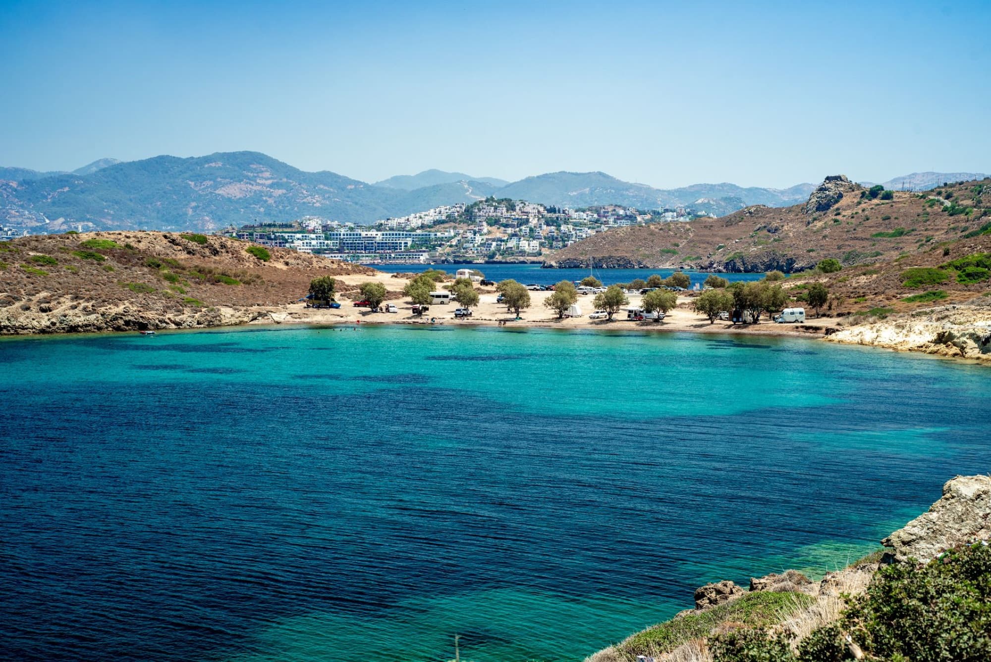 Crystal clear Aegean Sea near Bodrum, Turkey with scenic mountains and coastline.