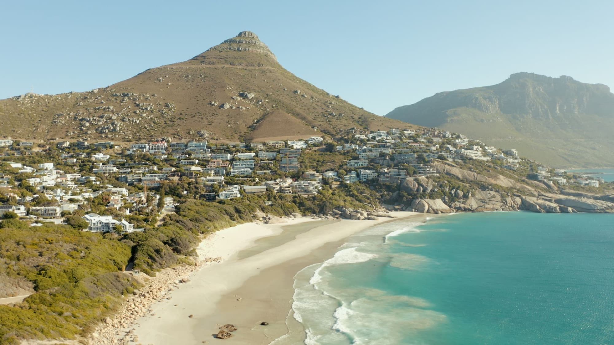 Aerial view of beach and mountains in Cape Town, South Africa. Perfect for travel inspiration.
