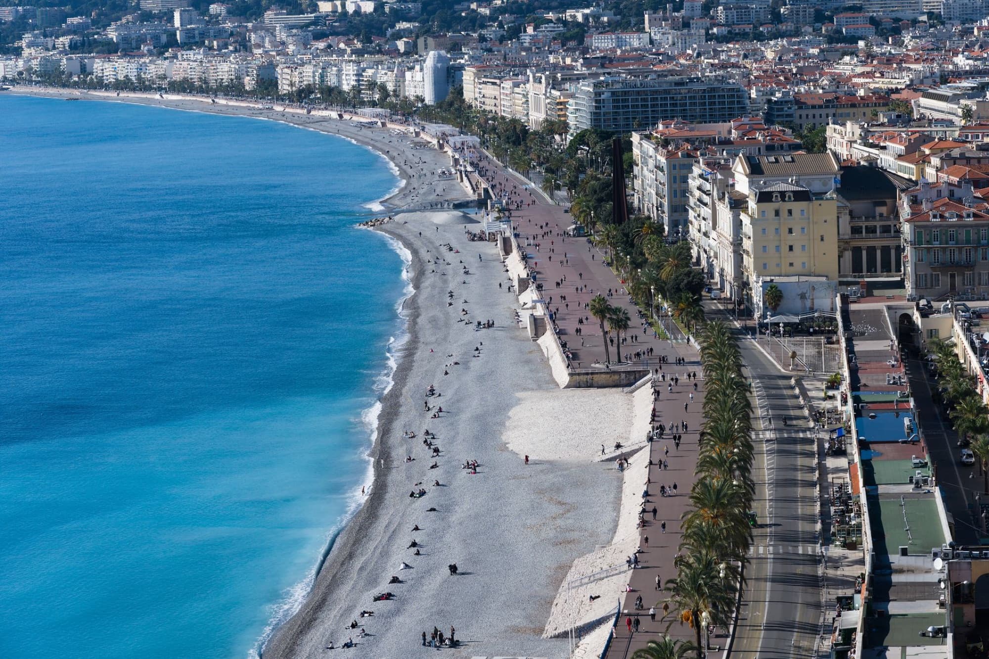 A scenic aerial view of the Nice beach and promenade in France.