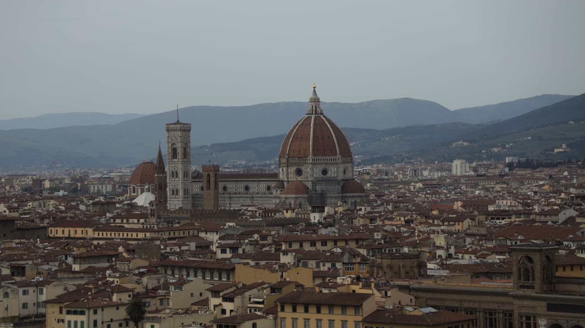 Captivating aerial view of Florence with the iconic Cathedral and historic skyline.