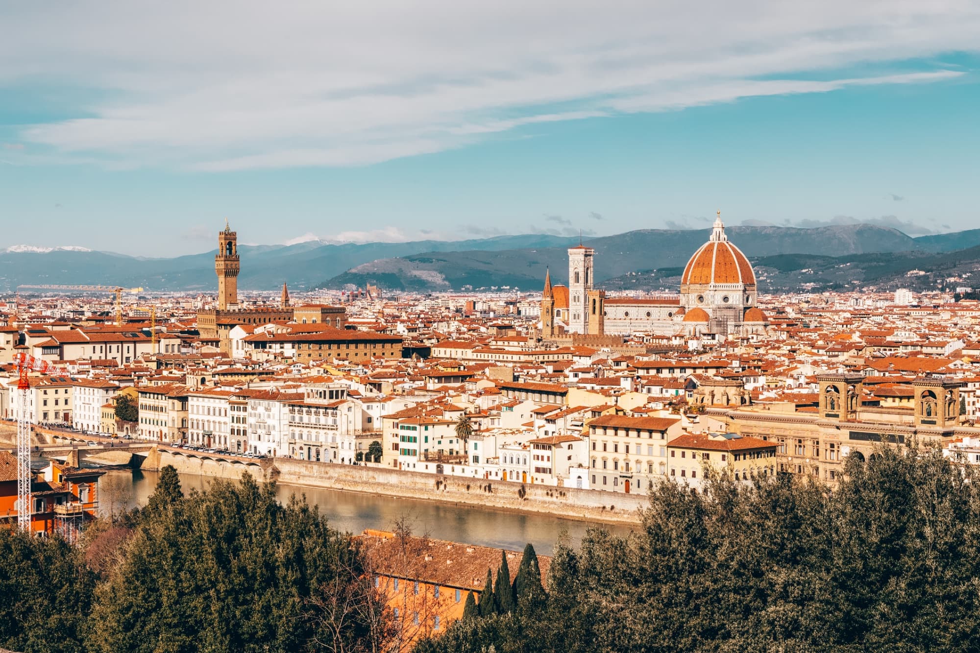 Beautiful aerial view of Florence's iconic skyline and architecture captured on a sunny summer day.
