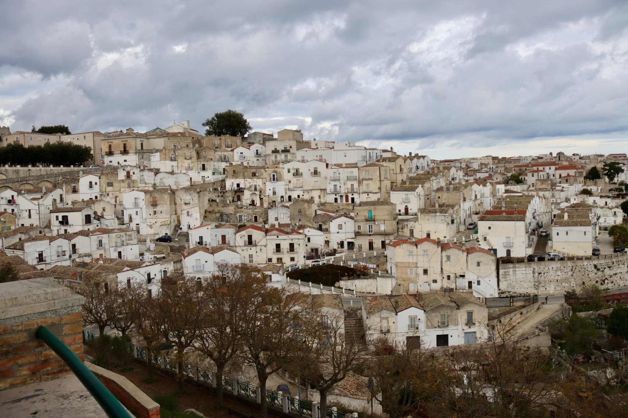 A panoramic view of the charming whitewashed architecture in Monte Sant'Angelo, Puglia, Italy.