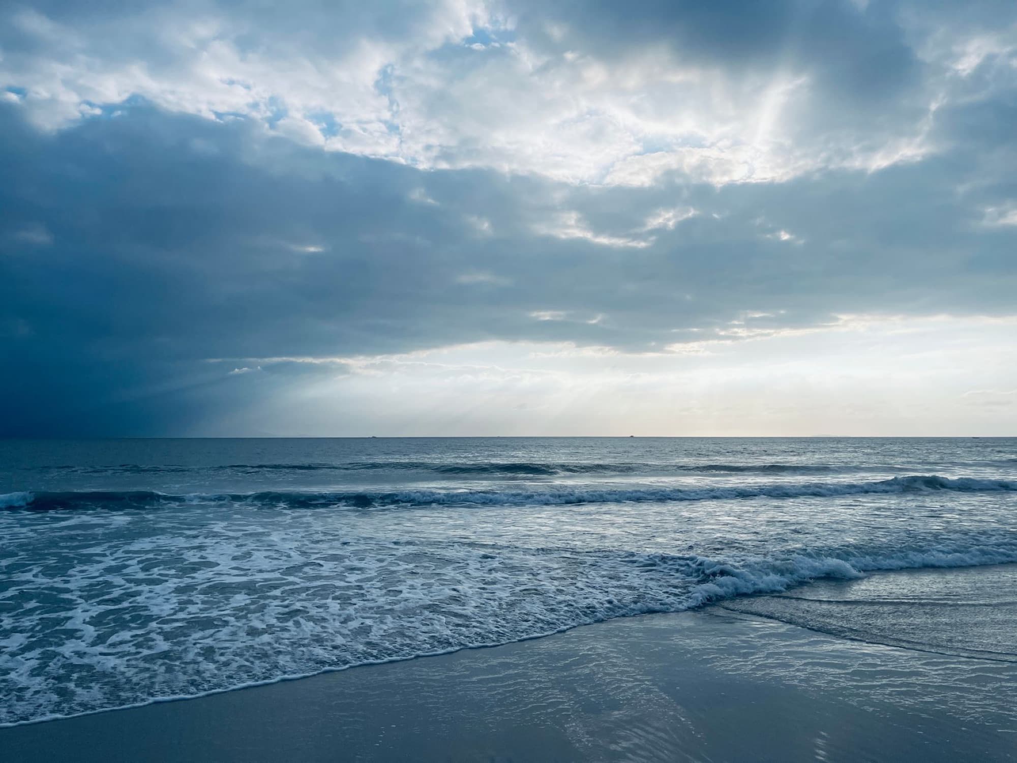 Peaceful ocean view at Punta Mita, Mexico with morning clouds and gentle waves.