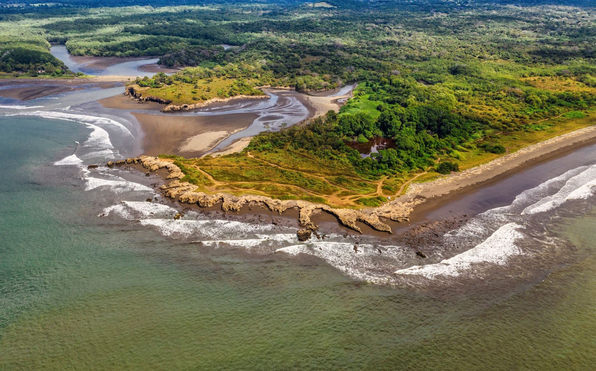 Stunning aerial shot of the lush coastline in Puntarenas, Costa Rica.