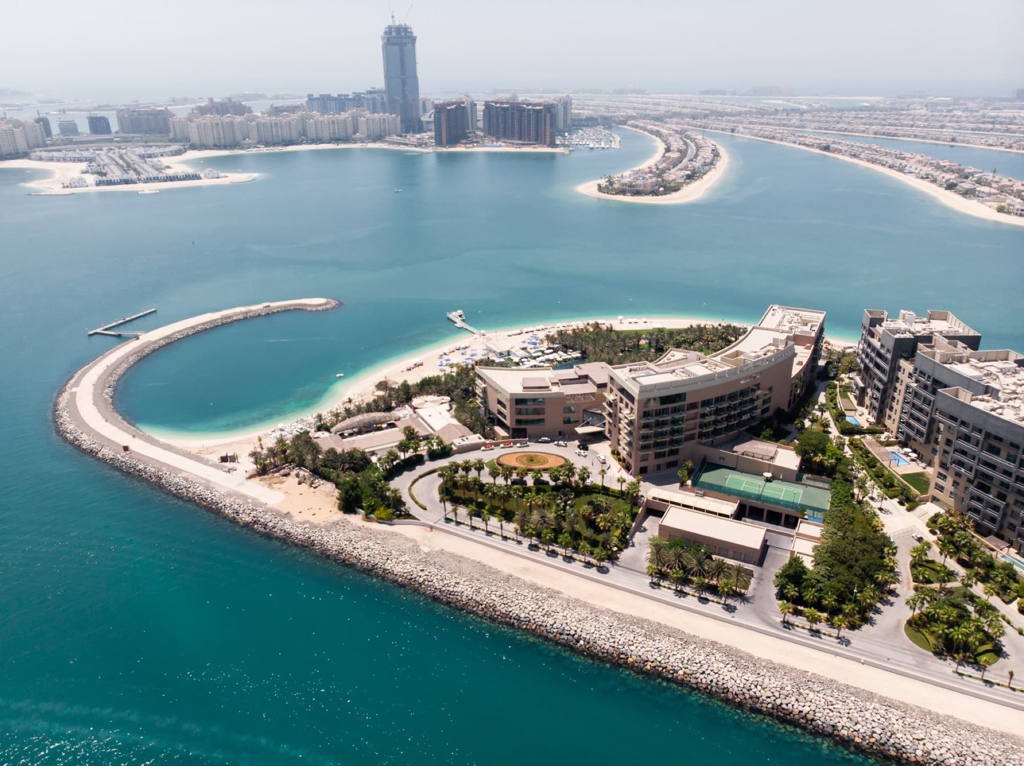 Explore the luxurious Palm Island and iconic skyline of Dubai from a breathtaking aerial perspective.
