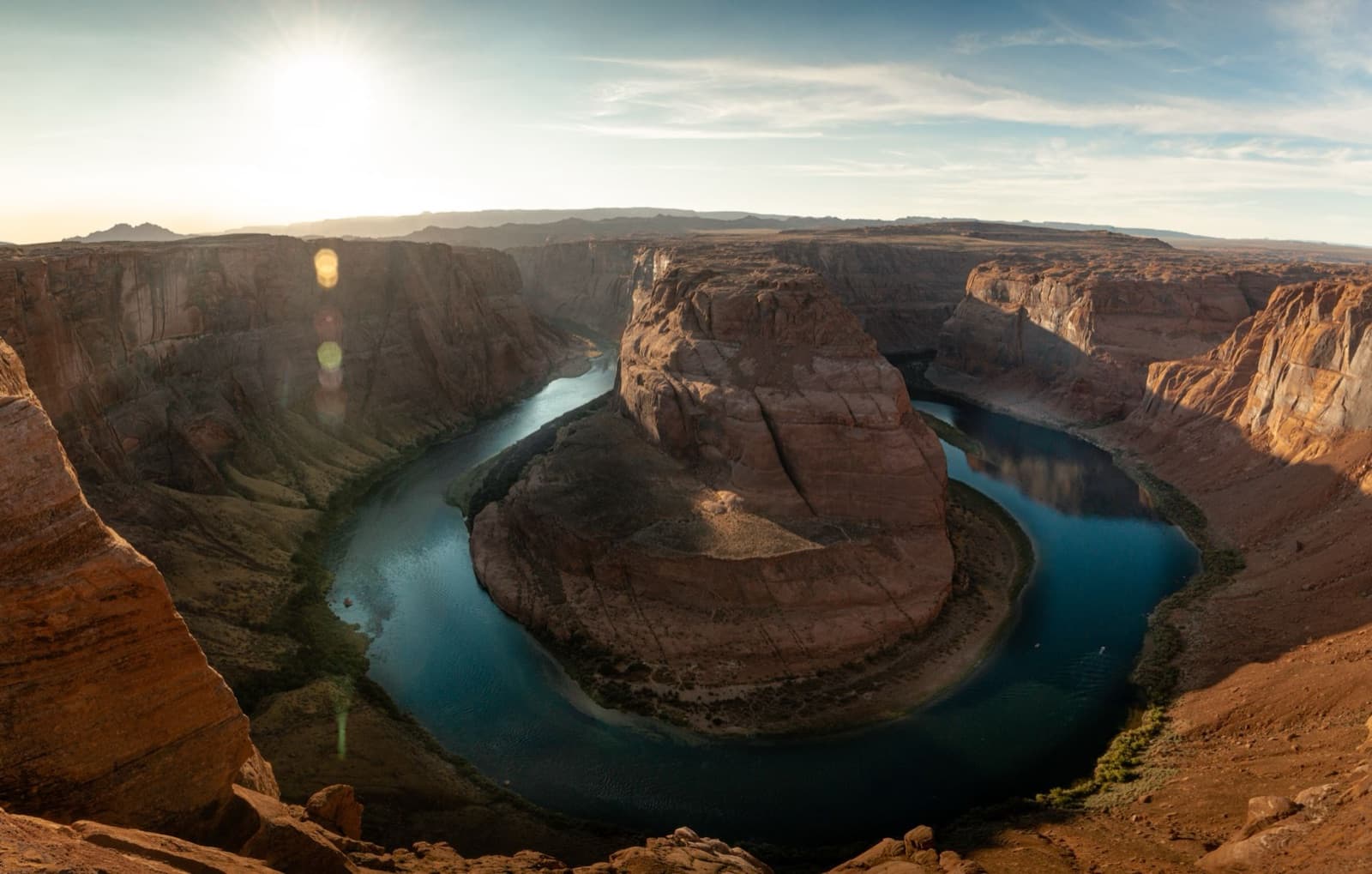 Stunning aerial view of Horseshoe Bend with the Colorado River in Arizona's scenic desert landscape.