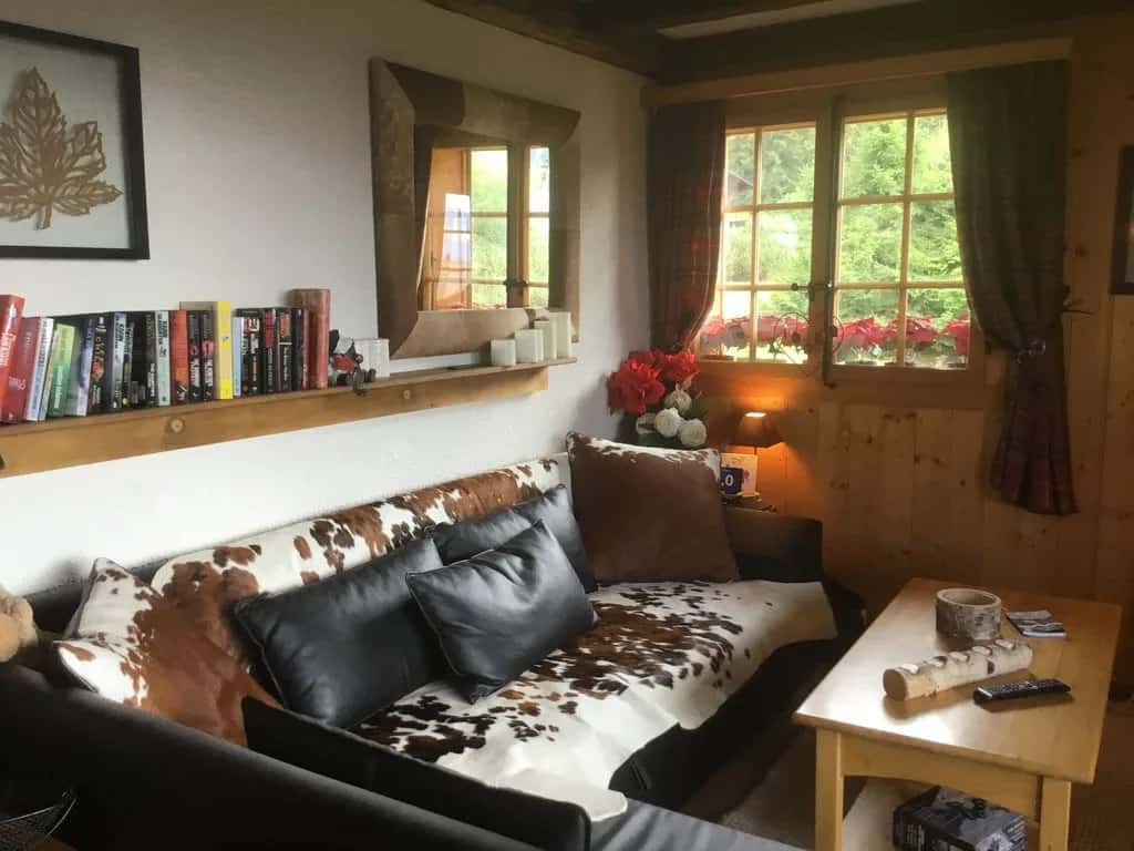 Typical Swiss Wooden Chalet Set In A Peaceful Location